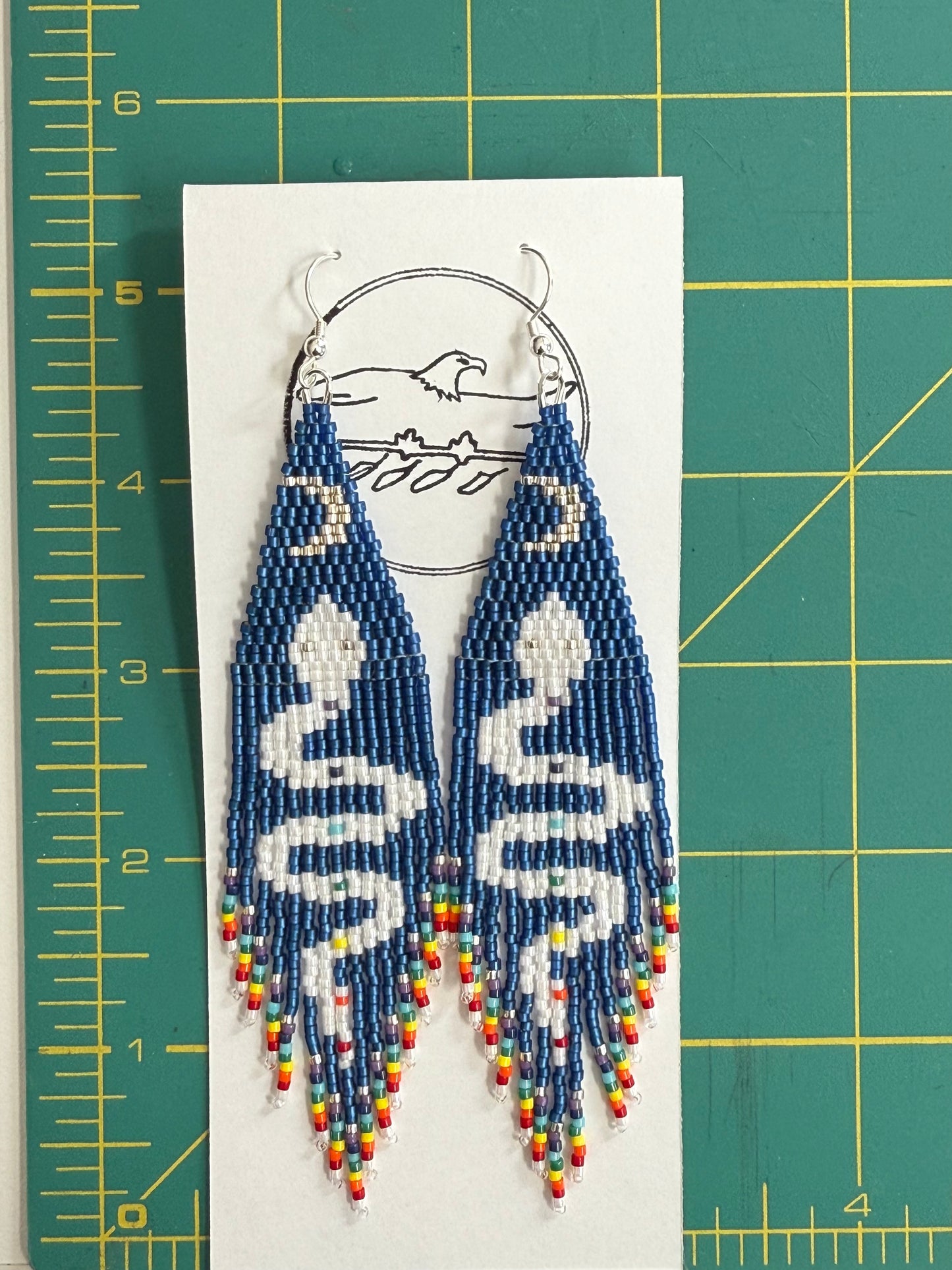 Beaded blue fringe earrings 2 with white snake silver eyes with rainbow and crescent waxing moon