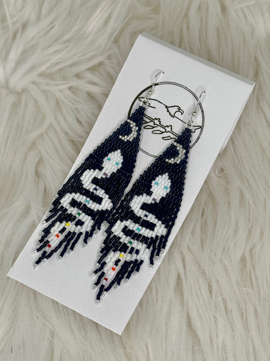 Beaded dark navy blue fringe earrings with white and rainbow snake with blue eyes and crescent waxing moon